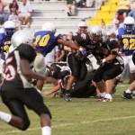 Chiles running Back fighting for yardage