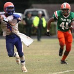 Alex Watson #45 rushes  Jefferson QB
