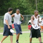 Coach Klees on the field with his young players