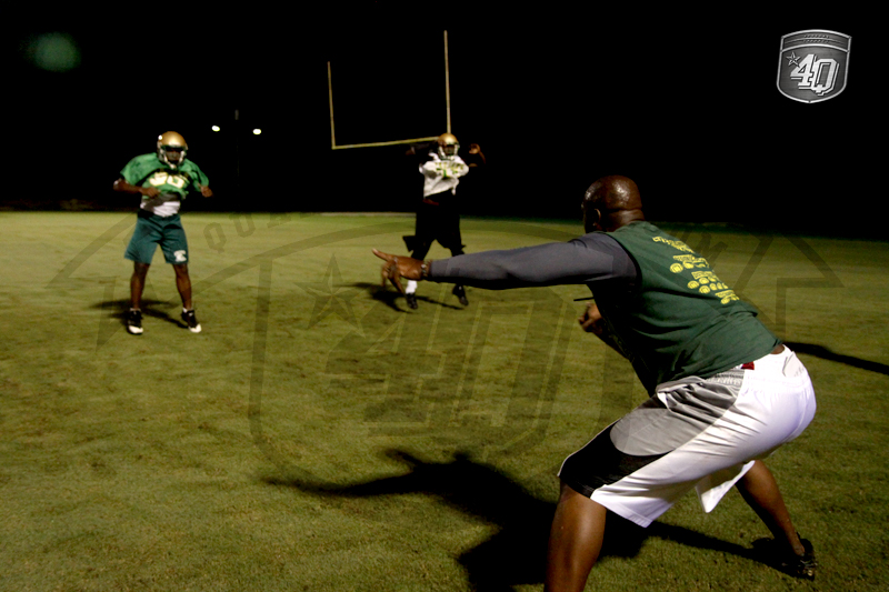 Coach Boo Williams directs his players at Lincolns Midnight Madness