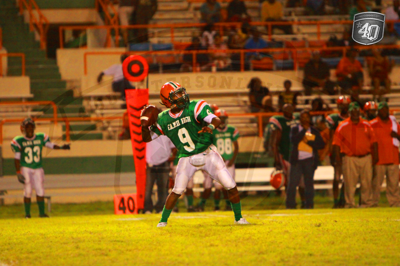 The Baby Rattlers QB #9, JaVarius Jones, steps back for the throw.