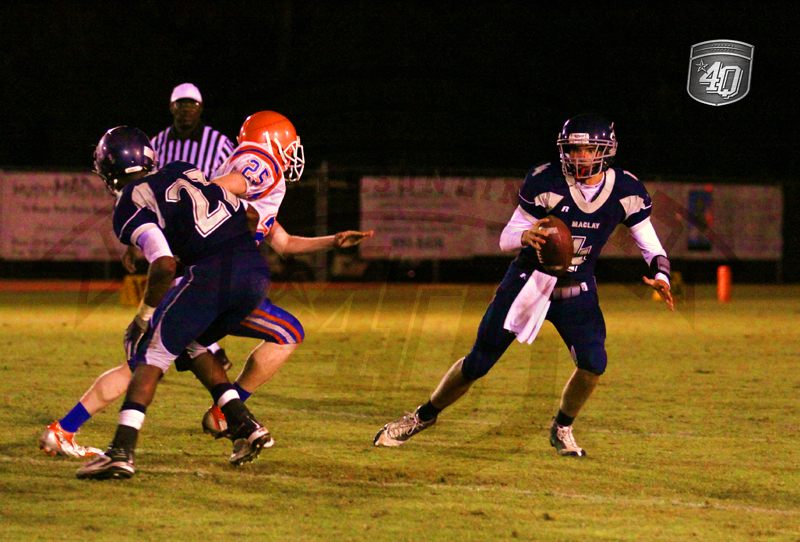 Maclays QB tries to elude a Bronson defender