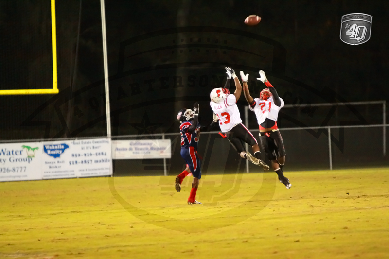 Two Leon defenders pake a play on a pass attempt for a Wakulla receiver