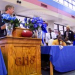 Godby Head Football Coach Ronnie Cottrell address the crowd in the schools media center for their 2012 Signing Day ceremony. The Cougars had 6 commits to Division 1 schools