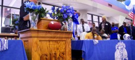 Godby Head Football Coach Ronnie Cottrell address the crowd in the schools media center for their 2012 Signing Day ceremony. The Cougars had 6 commits to Division 1 schools