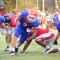Taylor County RB #7 J. Smymios grinds through the NFC defense for a gain in the 1st quarter. The Bulldogs went on to win the spring game 14-7.