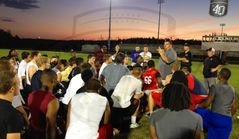 Team Florida head coach Mike Coe address his players after their final practice. Many notable seniors from around the area will be featured against the Georgia all-stars.